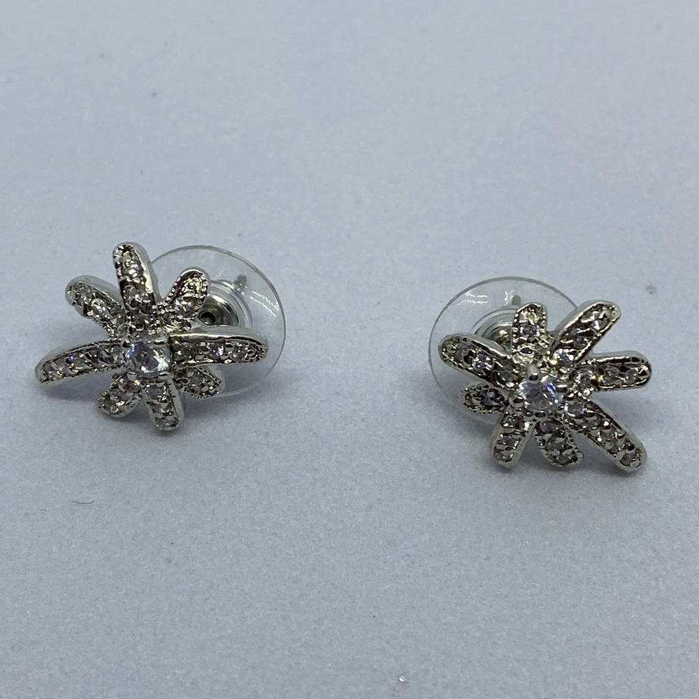 Silver tone clear CZ pierced earrings.